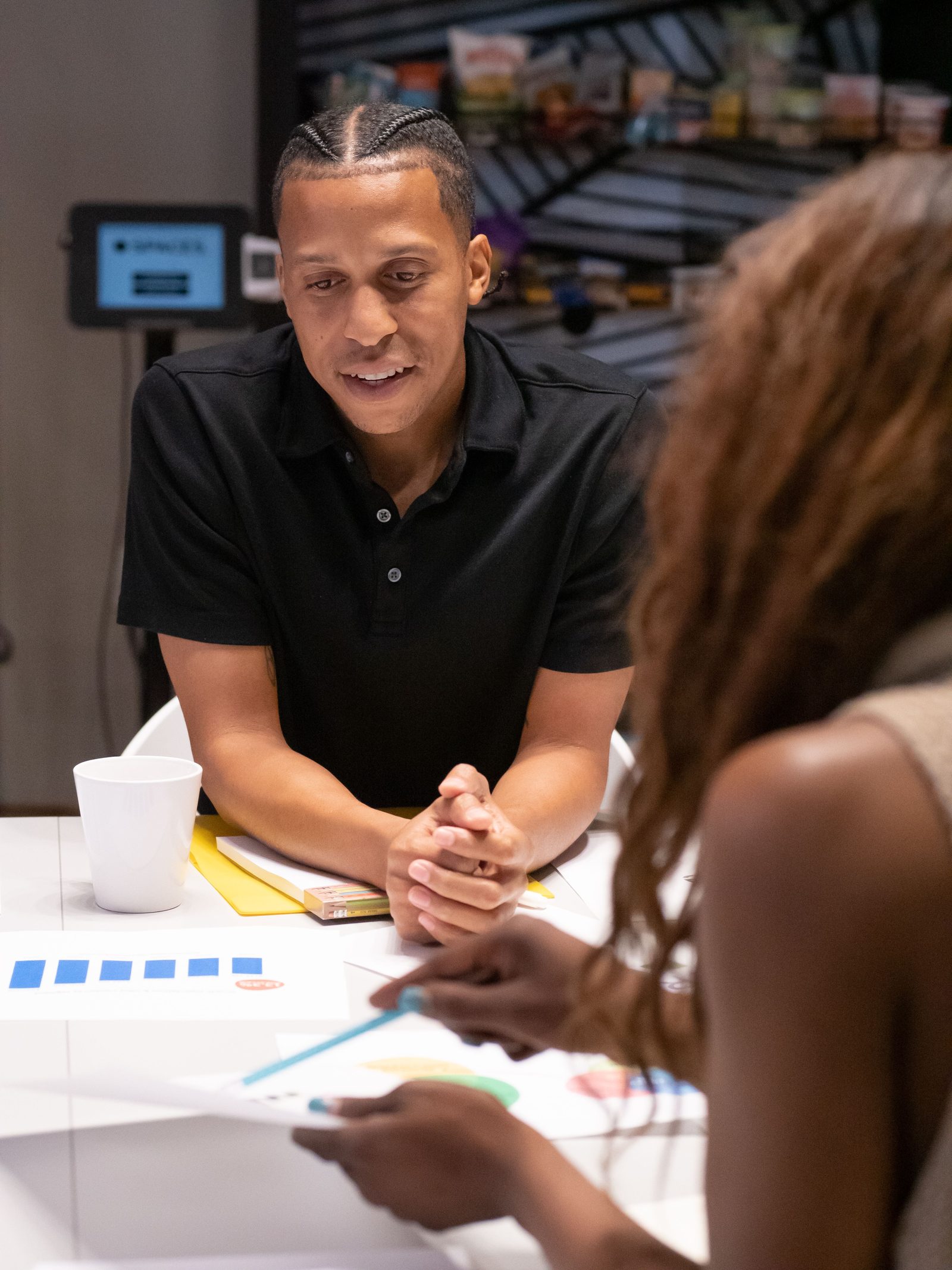 Business professionals discussing documents during a collaborative meeting