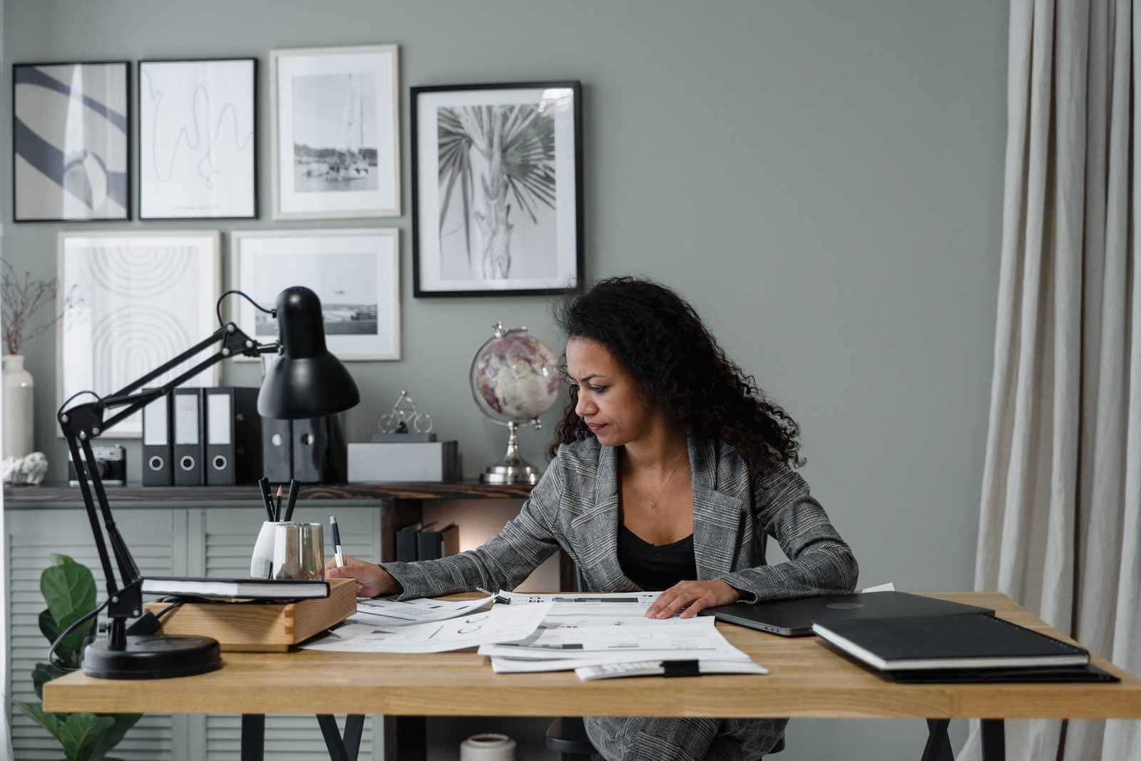 Business owner reviewing financial documents in an office